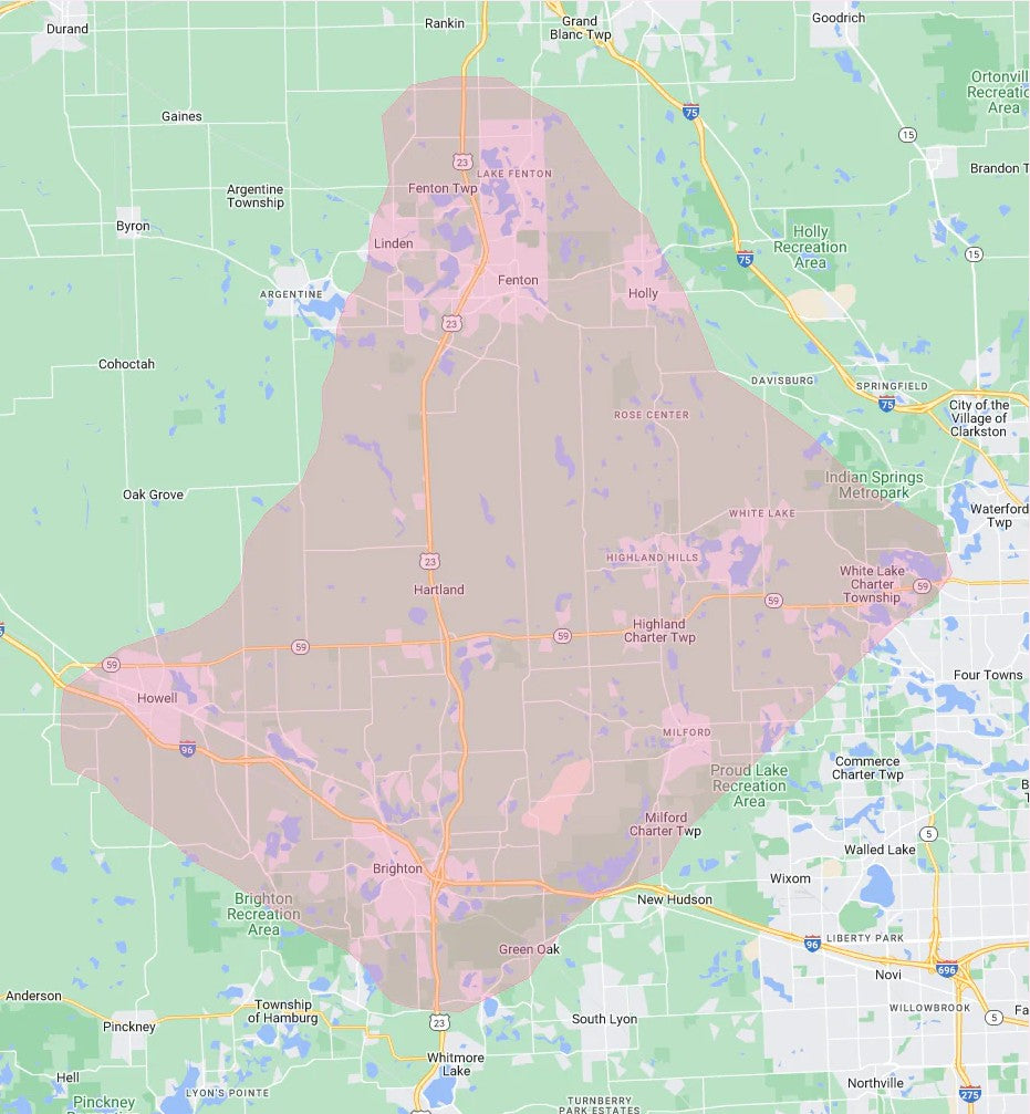 Map of the Grooming With Kate service area, a shaded region covering Hartland, Fenton, Howell, Brighton, Milford, Highland, White Lake, Holly, Linden, and nearby Michigan towns